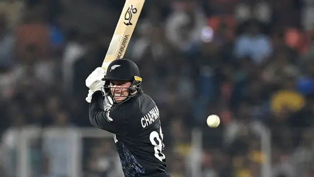 New Zealand's Mark Chapman plays a shot during the 2026 ICC Men's T20 Cricket World Cup group stage match between New Zealand and South Africa