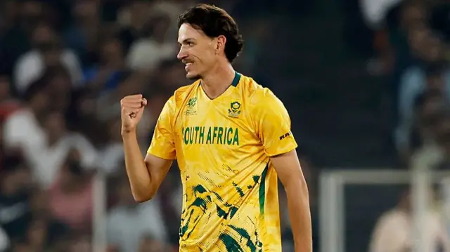 Marco Jansen of South Africa celebrates after taking the wicket of Mark Chapman of New Zealand