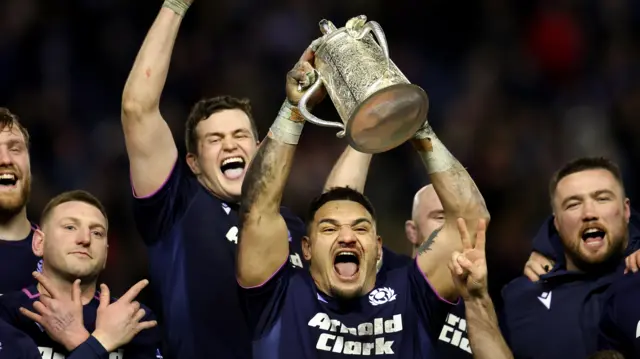 Sione Tuipulotu lifts the Calcutta Cup