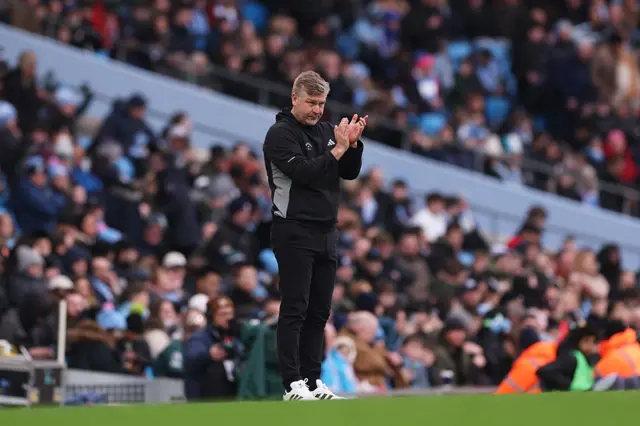 Robinson claps from his technical area