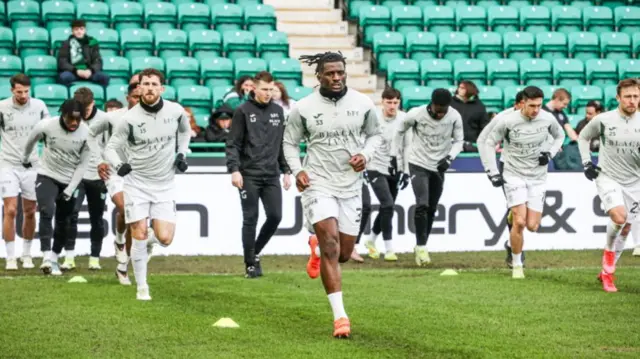Hibs warm up
