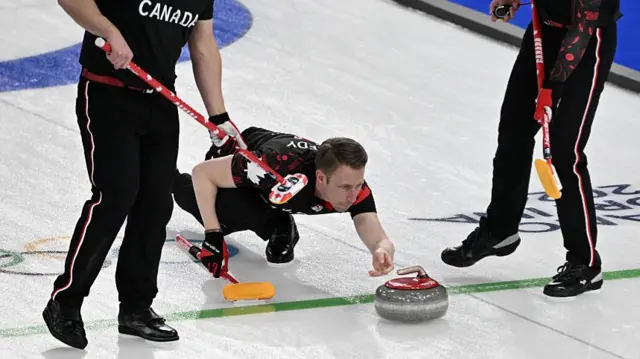Canadian curlers in action