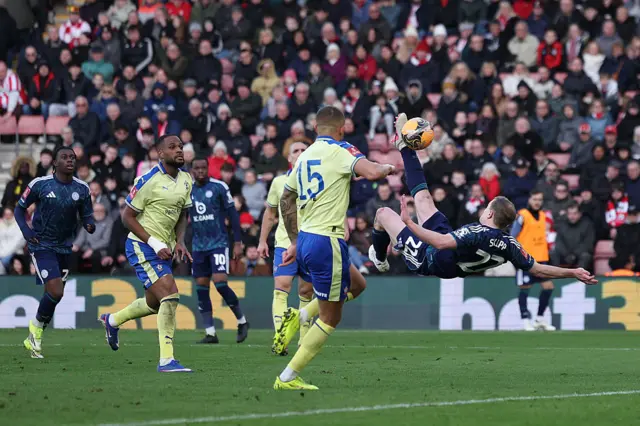 Oliver Skipp scores a bicycle kick