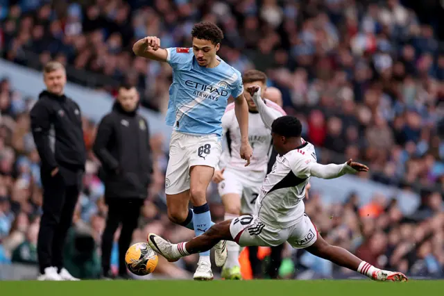 N'Mai lunges into a challenge on Max Alleyne.