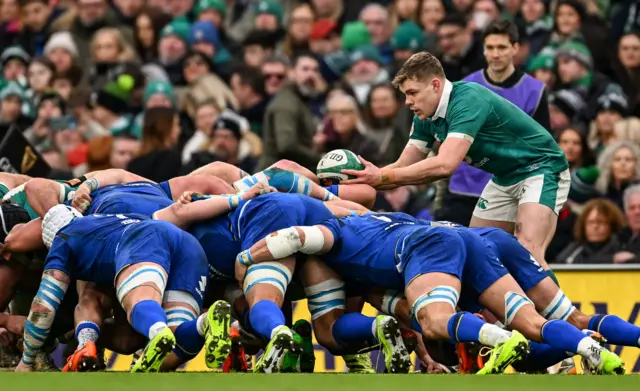 Garry Ringrose puts the ball into the scrum