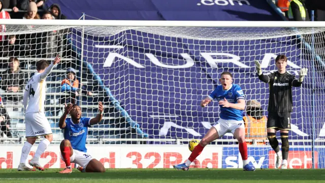 Portsmouth players contest disallowed goal