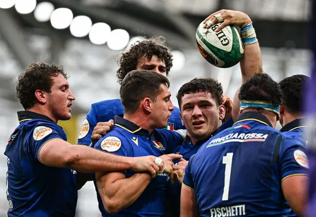 Italy celebrate Nicotera's try
