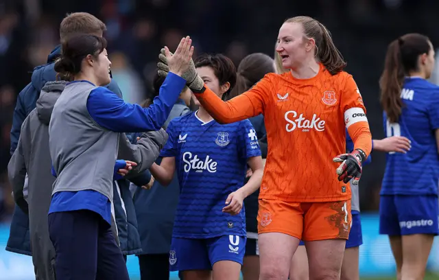 Everton players celebrate their win v LCL