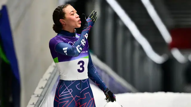 Tabithah Stoeker celebrates after her race