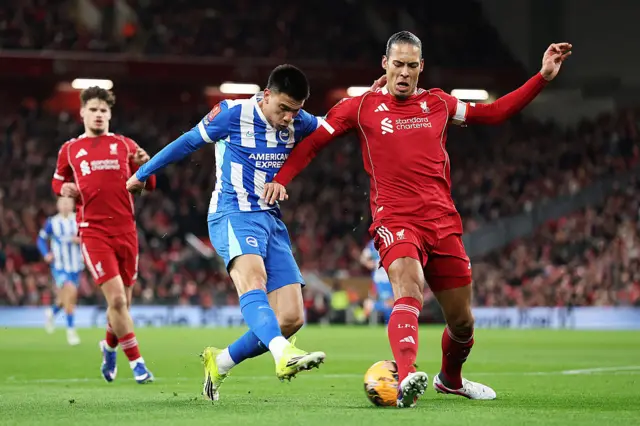 Virgil van Dijk tackles Gomez