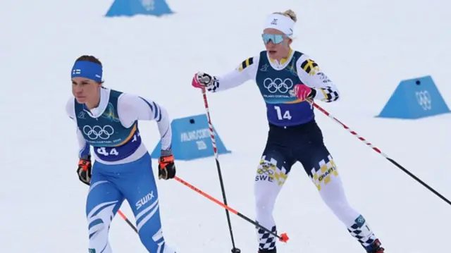 Finland and Sweden skiers in action