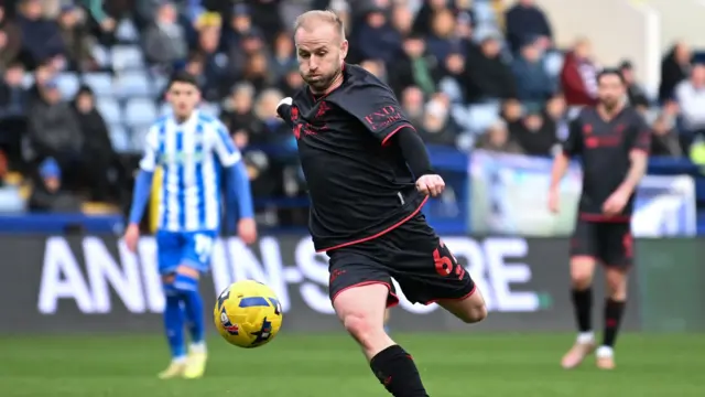 Barry Bannan with the ball for Millwall