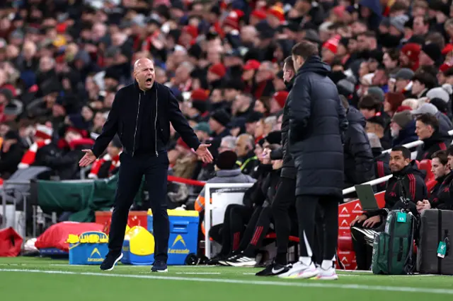 : Arne Slot, Manager of Liverpool, reacts towards fourth official Adam Herczeg