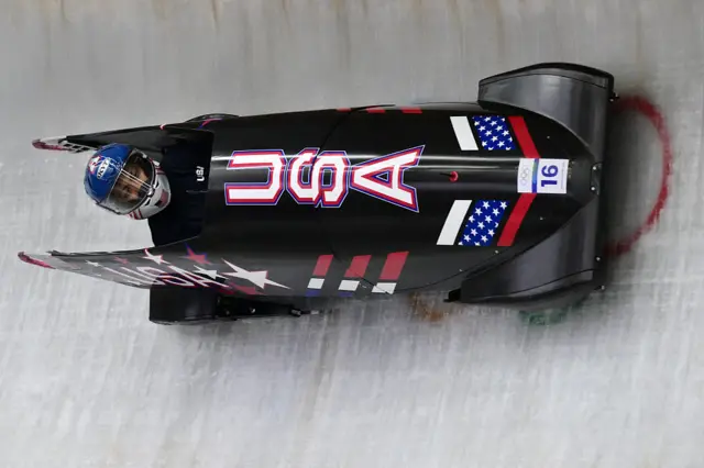 USA's Kaysha Love takes part in the bobsleigh women's monobob training session at Cortina Sliding Centre