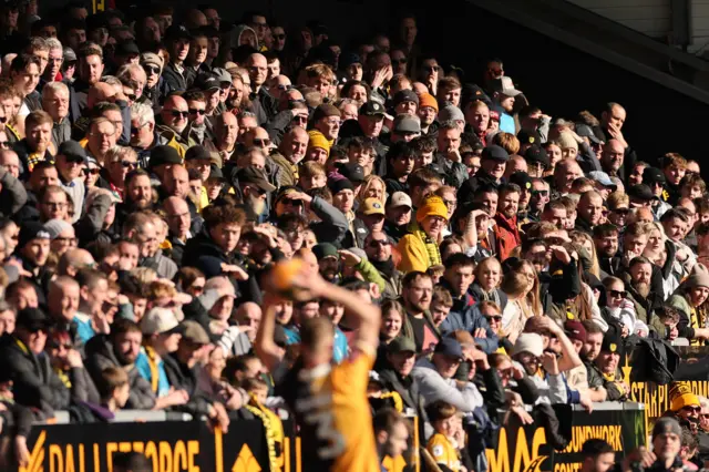 Burton Albion fans watch on