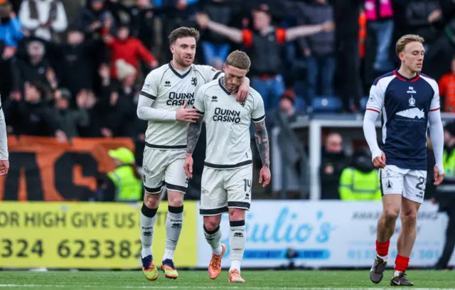 Craig Sibbald (right) refuses to celebrate for Dundee United