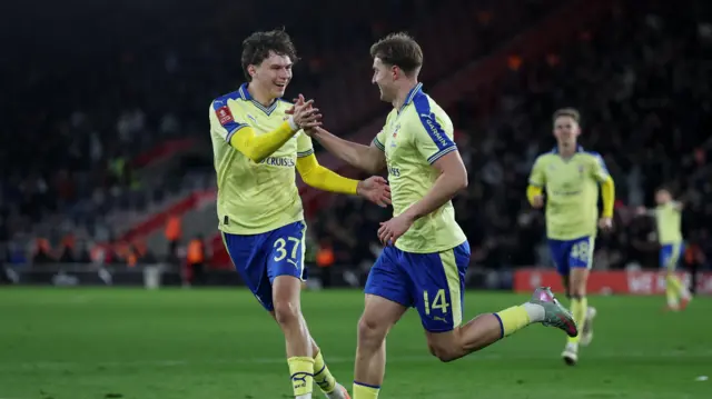 Southampton players run off to celebrate the winner