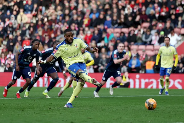 Cyle Larin calmly slots inhis penalty