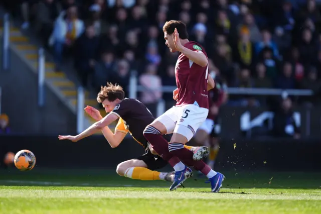 Mavropanos trips a burton attacker