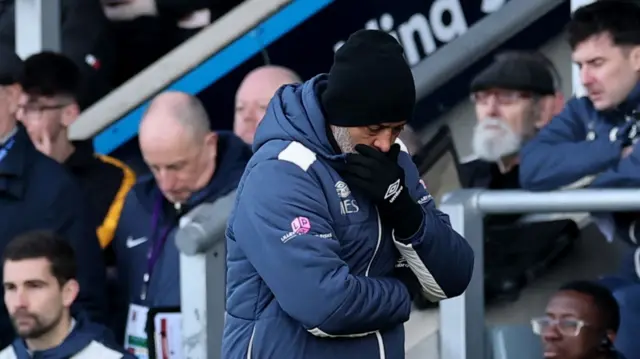 Nuno covers his mouth in disbelief