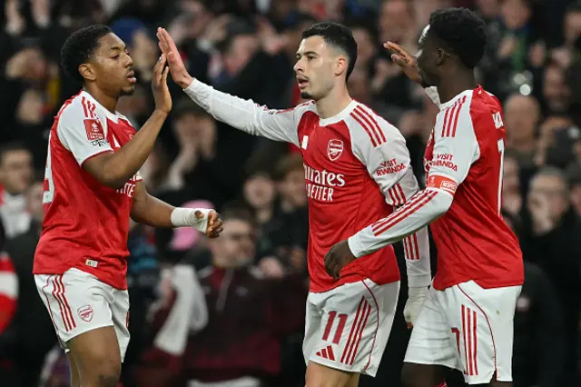Gabriel Martinelli (C) celebrates after scoring the team's second goal