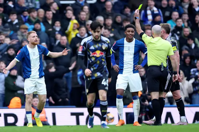 Carlos Vicente of Birmingham City is shown a Yellow card