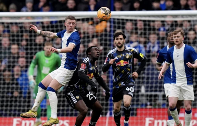 Birmingham City's Jay Stansfield (left) and Leeds United's Wilfried Gnonto (second left) battle for the ball