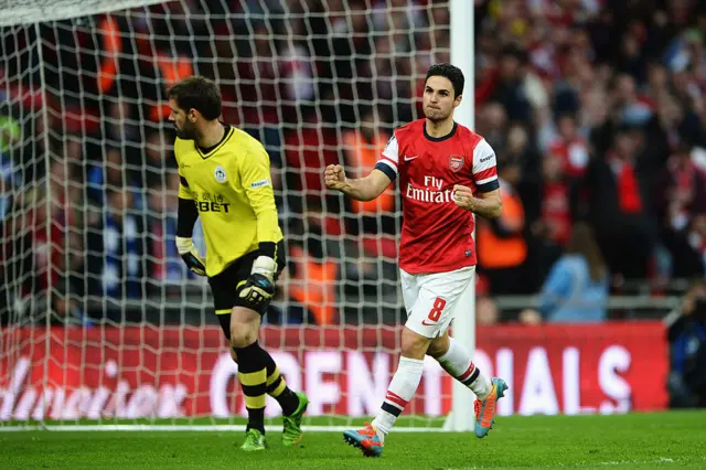 Mikel Arteta fist pumping after scoring penalty v Wigan in FA Cup semi-final