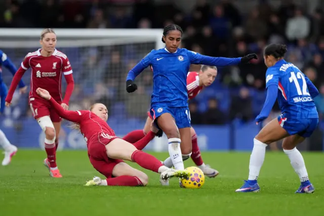 Chelsea's Naomi Girma and Liverpool's Denise O'Sullivan battle for the ball during the Barclays Women's Super League match at Kingsmeadow, London
