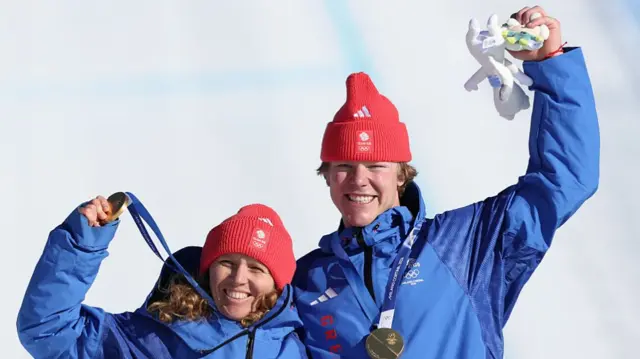 Charlotte Bankes and Huw Nightingale with their gold medals