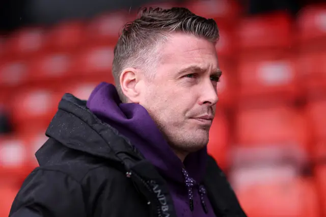 Rob Edwards, Manager of Wolverhampton Wanderers, looks on