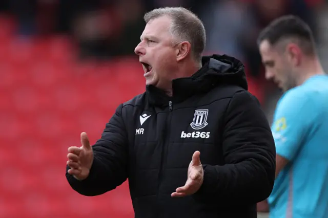 Mark Robins, Manager of Stoke City on the side line