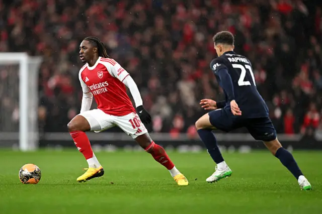 Eberechi Eze of Arsenal controls the ball under pressure from Raphael Borges Rodrigues