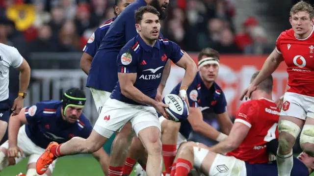 Antoine Dupont passes the ball for France against Wales in the 2025 Six Nations