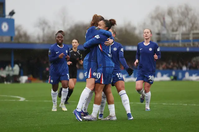 Sjoeke Nuesken of Chelsea celebrates scoring her team's first goal with teammate Lauren James