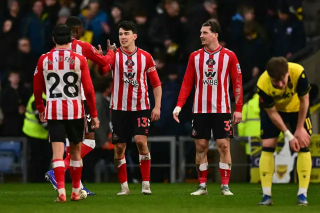 Sunderland's French midfielder #28 Enzo Le Fee (L), Sunderland's English midfielder #13 Luke O'Nien (C) and Sunderland's English defender #03 Dennis Cirkin (2nd R) react at the end of their victory