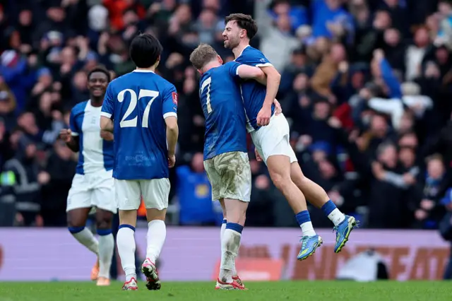 Tommy Doyle and Patrick Roberts of Birmingham City celebrate equalizing goal
