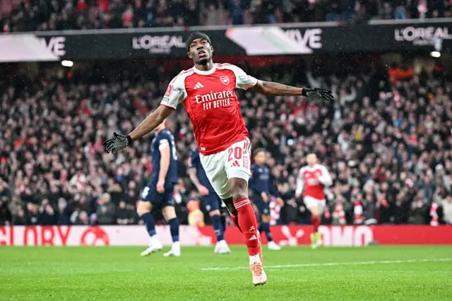 Noni Madueke of Arsenal celebrates