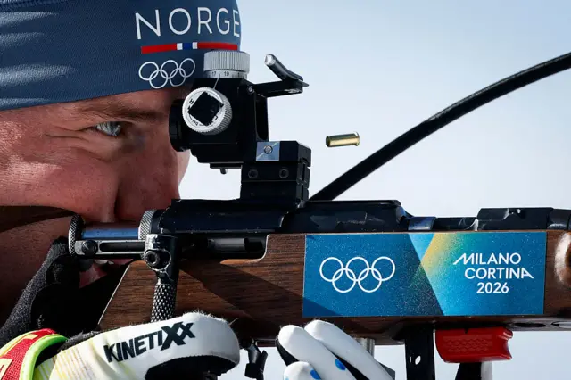 Norway's Johan-Olav Botn warms up in the shooting range ahead of the men's biathlon 12,5km pursuit event
