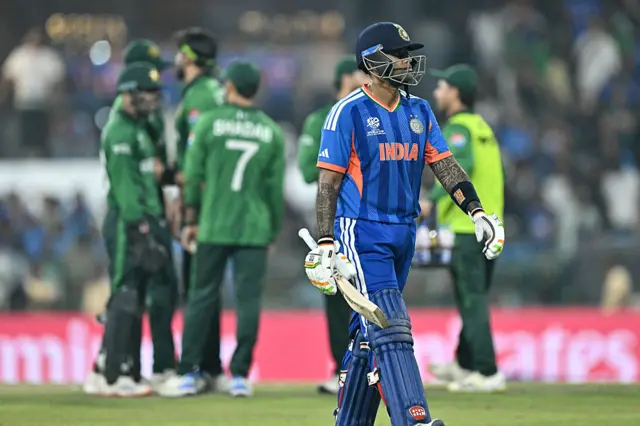 India's captain Suryakumar Yadav walks back to the pavilion after his dismissal during the 2026 ICC Men's T20 Cricket World Cup group stage match between India and Pakistan at the R Premadasa Stadium