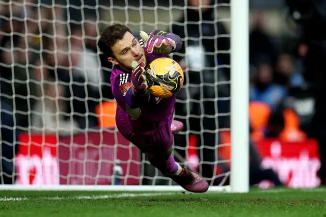Lucas Perri of Leeds United saves a penalty kick