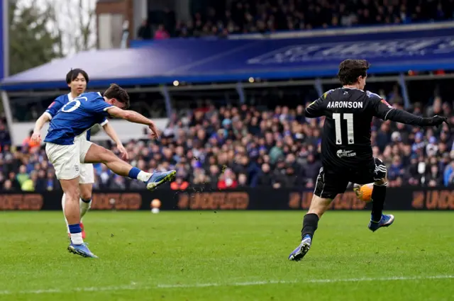 Birmingham City's Patrick Roberts (left) scores his sides first goal