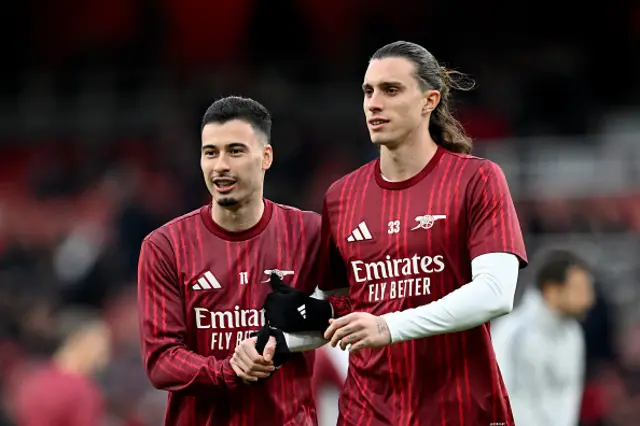 Gabriel Martinelli and Riccardo Calafiori of Arsenal interact during the warm up