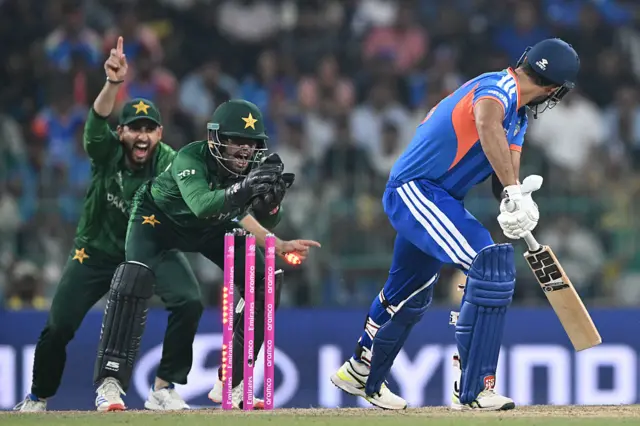 Pakistan's wicketkeeper Usman Khan (C) and captain Salman Agha (L) unsuccessfully appeal for leg before wicket (LBW) against India's Shivam Dube during the 2026 ICC Men's T20 Cricket World Cup group stage match between India and Pakistan