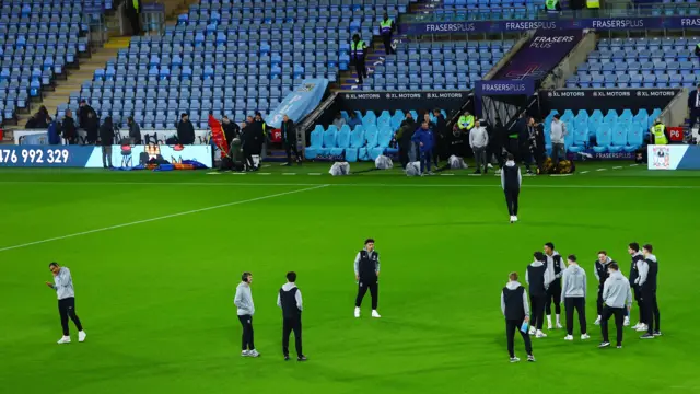 Middlesbrough players inspect the Coventry City pitch before kick-off