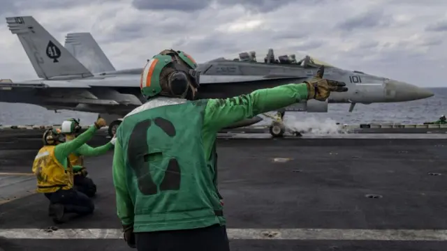 A US F/A-18 Super Hornet is launched from the flightdeck of USS Abraham Lincoln on 1 February