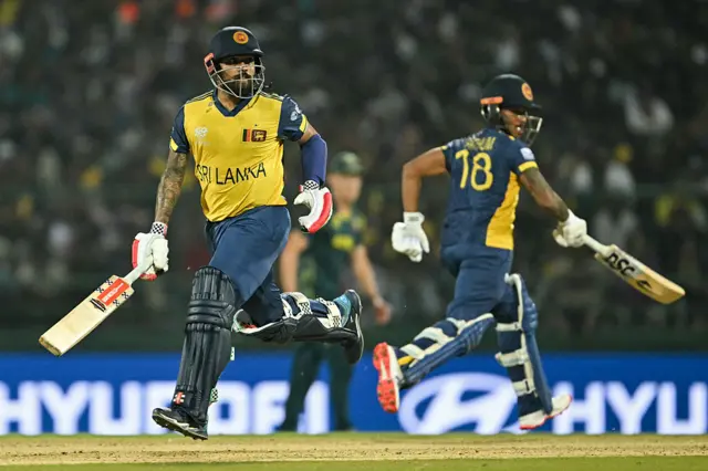 Sri Lanka's Kusal Mendis (L) and Pathum Nissanka run between the wickets