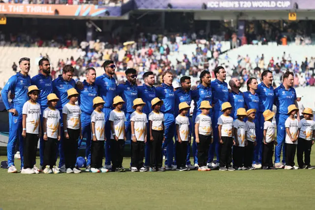 Italy line up for the national anthems
