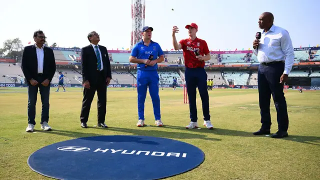 : Harry Brook of England and Harry Manenti of Italy take part in the coin toss