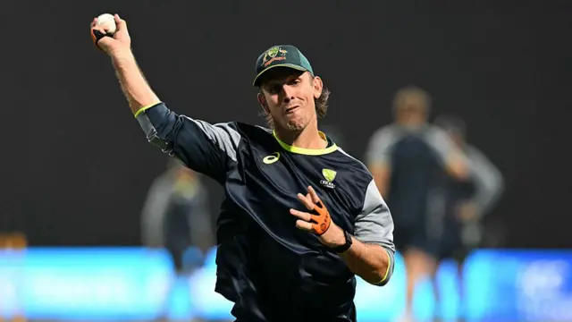 Australia's captain Mitchell Marsh warms up
